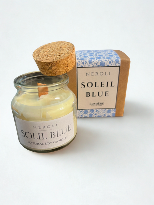 נר זכוכית עם מכסה שעם | שמש כחולה